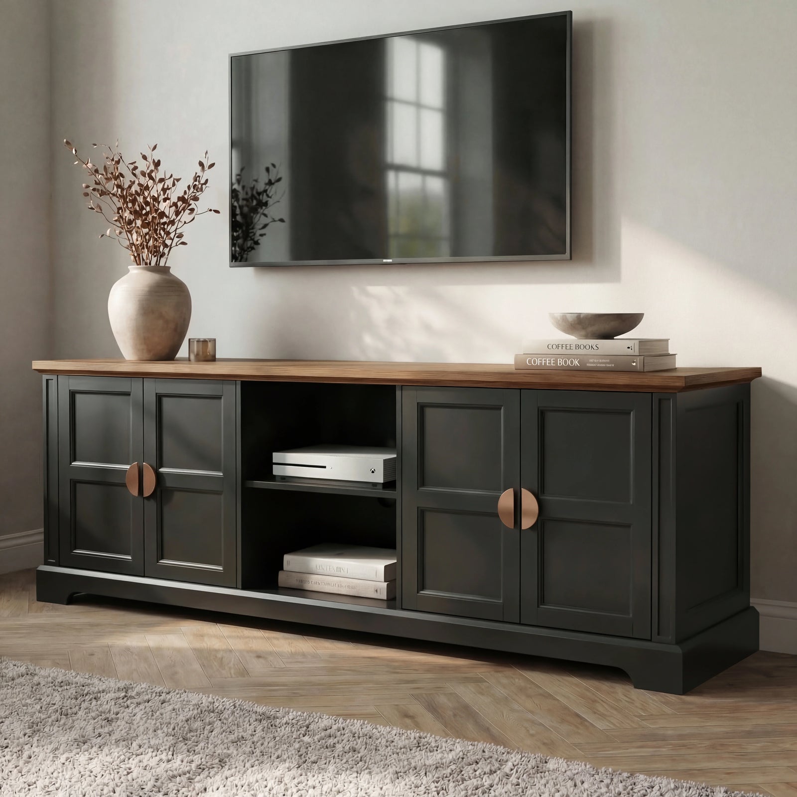 [Black] Bellford TV unit at an angle showing depth of cabinet, oak top overhang, copper handles on shaker doors