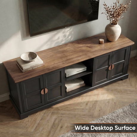 [Black] Bellford TV unit high angle, oak top styled with vase of stems, side cabinets closed, plinth at floor