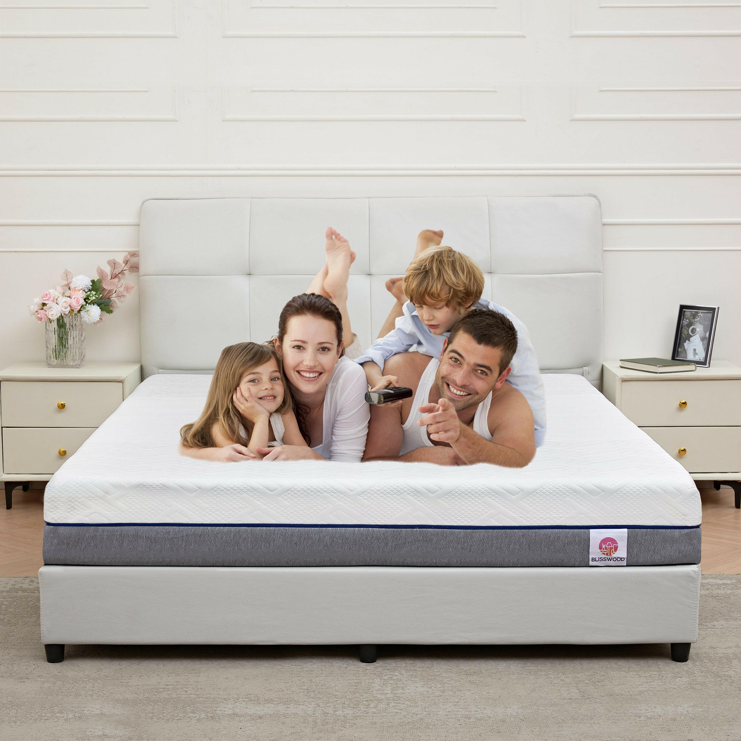 Happy family relaxing on a best king size mattress, designed for ultimate comfort.