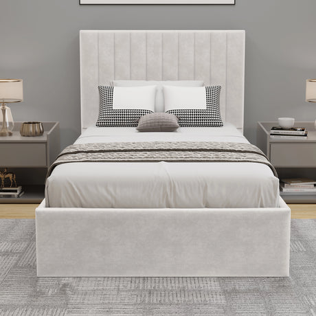 Beige upholstered bed with white bedding in a bedroom setting.