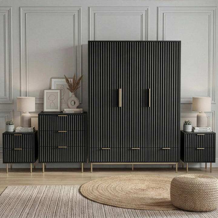 [Black] four piece bedroom furniture set placed on wooden flooring, including a wardrobe, dresser, and two bedside tables