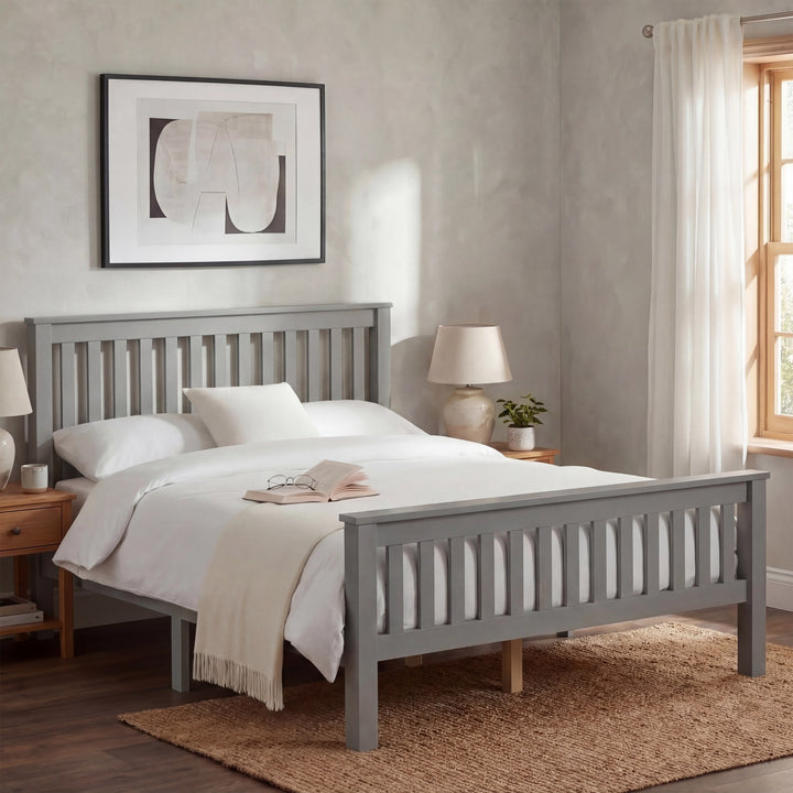 [Grey] wooden double bed frame grey, flanked by oak bedsides, art above and small plant on right