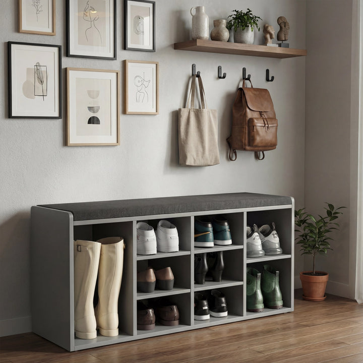 [Grey] Hallway shoe storage bench grey finish, framed art wall above, cream boots in left cubby