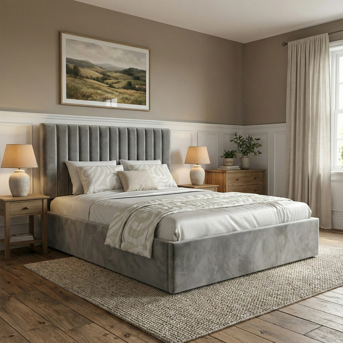 [Grey | King] ottoman bed with fluted headboard in cottage-style room with wooden bedside tables and landscape painting