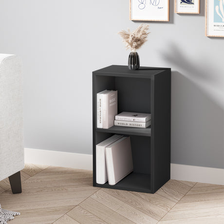 angled front view of modern black 2 tier bookshelf with stylish decor and books, perfect for bedroom or hallway styling