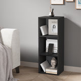 angled front view of 3 tier black free standing shelves styled with books and decor for flexible room storage
