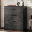 [Black] four drawer chest styled in neutral interior with floor lamp and decorative accessories
