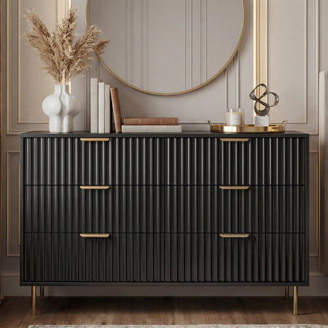 Front elevation of black 6 drawer chest with flutrina drawer fronts, golden handles and legs