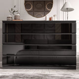 [black] high gloss 8 drawer chest front view closed in bedroom with gold mirror and lamp
