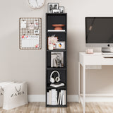 Tall black narrow bookshelf beside a desk, ideal for organizing books and accessories in a stylish workspace.