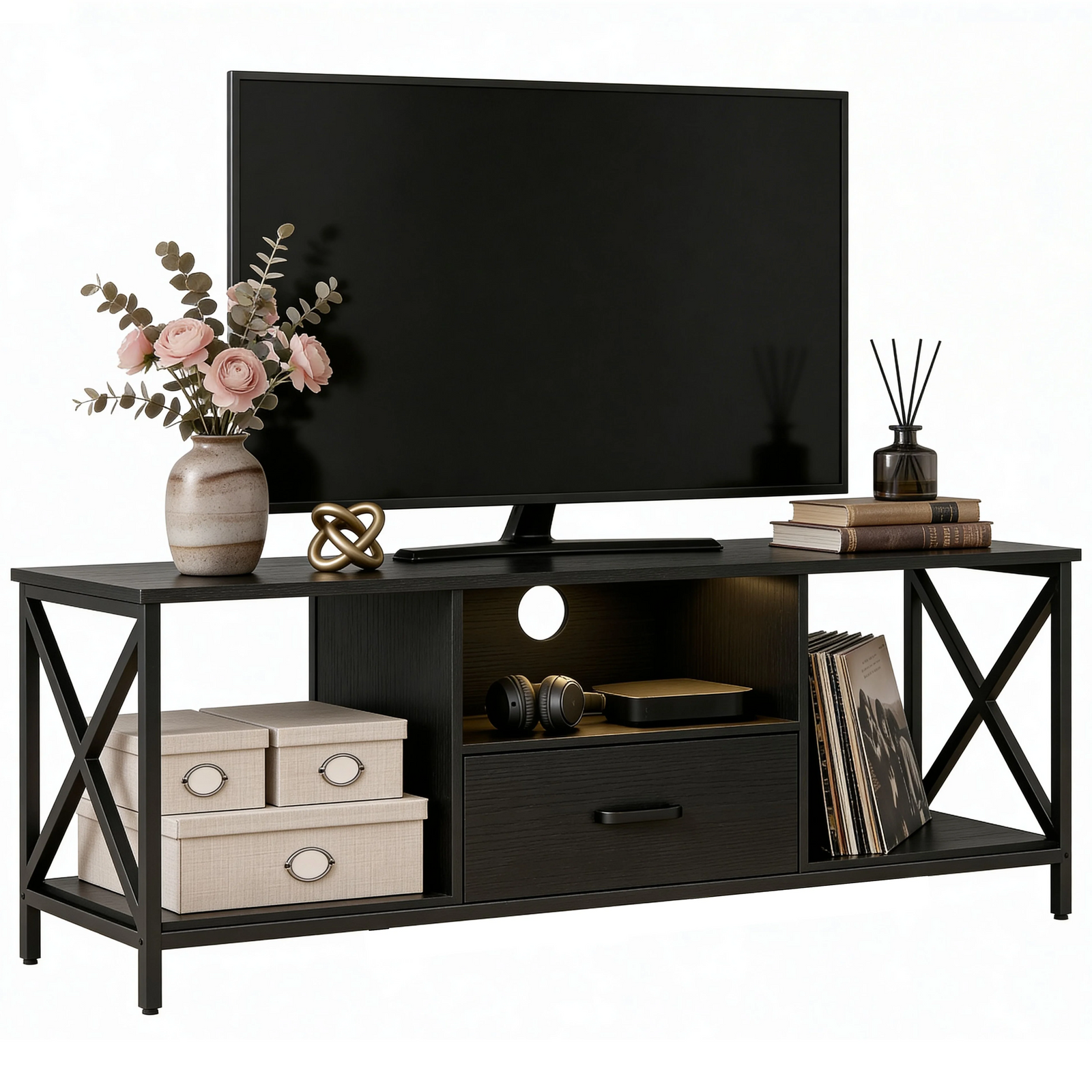 [Black] Calvera TV stand on a white background with a large TV on top and warm LED in the centre shelf with headphones