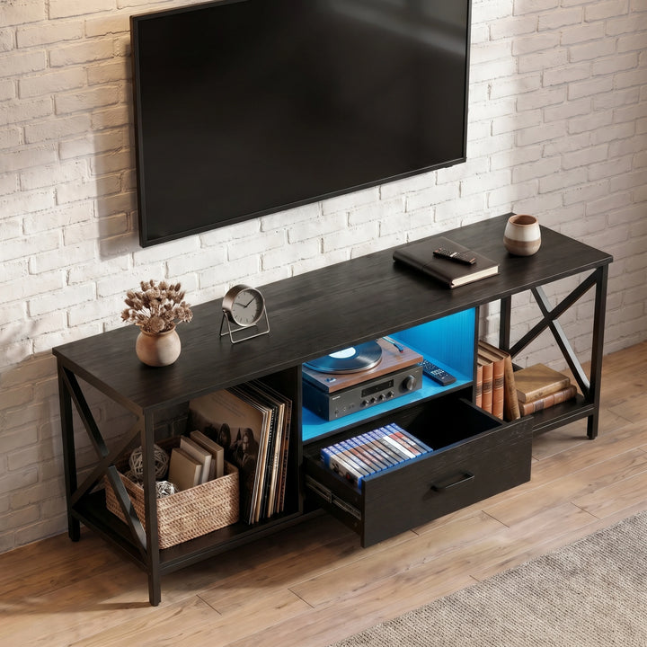 [Black] Calvera TV unit overhead angle showing open drawer with hidden storage, LED-lit shelf and X-frame side panels