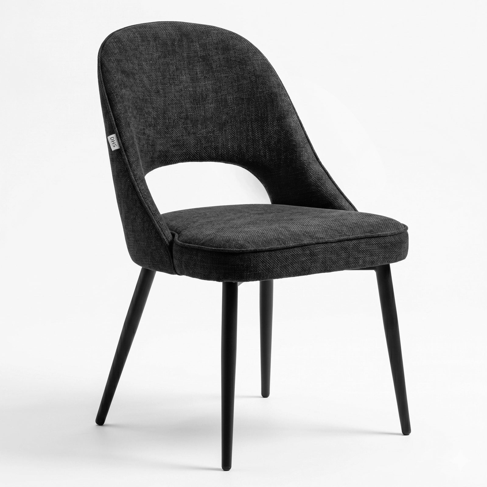 [Black | Set of 2] Angled view of fabric dining chair with rounded open back, piped seat and four black legs.