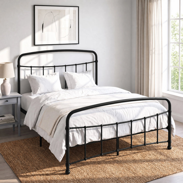 [Black | Double] Black metal bed frame with curved rails and white bedding, shown at a 3/4 Angle in bright bedroom.