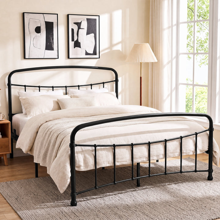 [Black | King] Black metal bed frame with curved rails and cream bedding, shown at a 3/4 Angle in bright bedroom.