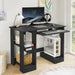 Home Office Computer Desk With Shelves For Working, Reading & Gaming in black finish, featuring a pull-out keyboard tray, monitor, and PC tower setup.