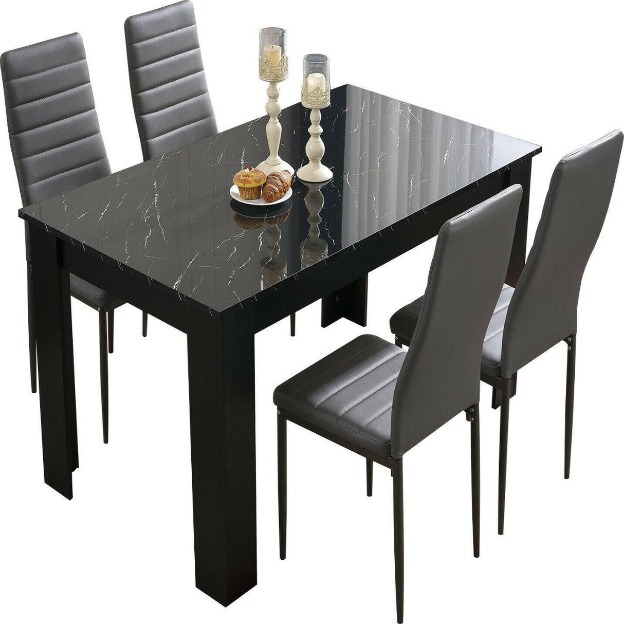 Black dining set featuring a modern design, ideal for creating a stylish dining space.