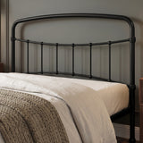 [Black | Double] Headboard close-up showing curved rail, vertical bars, ball details, wrapped joints, bedding, and throw.