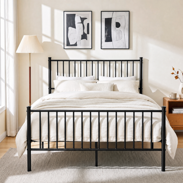 [Black | Double] Front view of black metal double bed with tall bar headboard, matching footboard, cream bedding & centre leg
