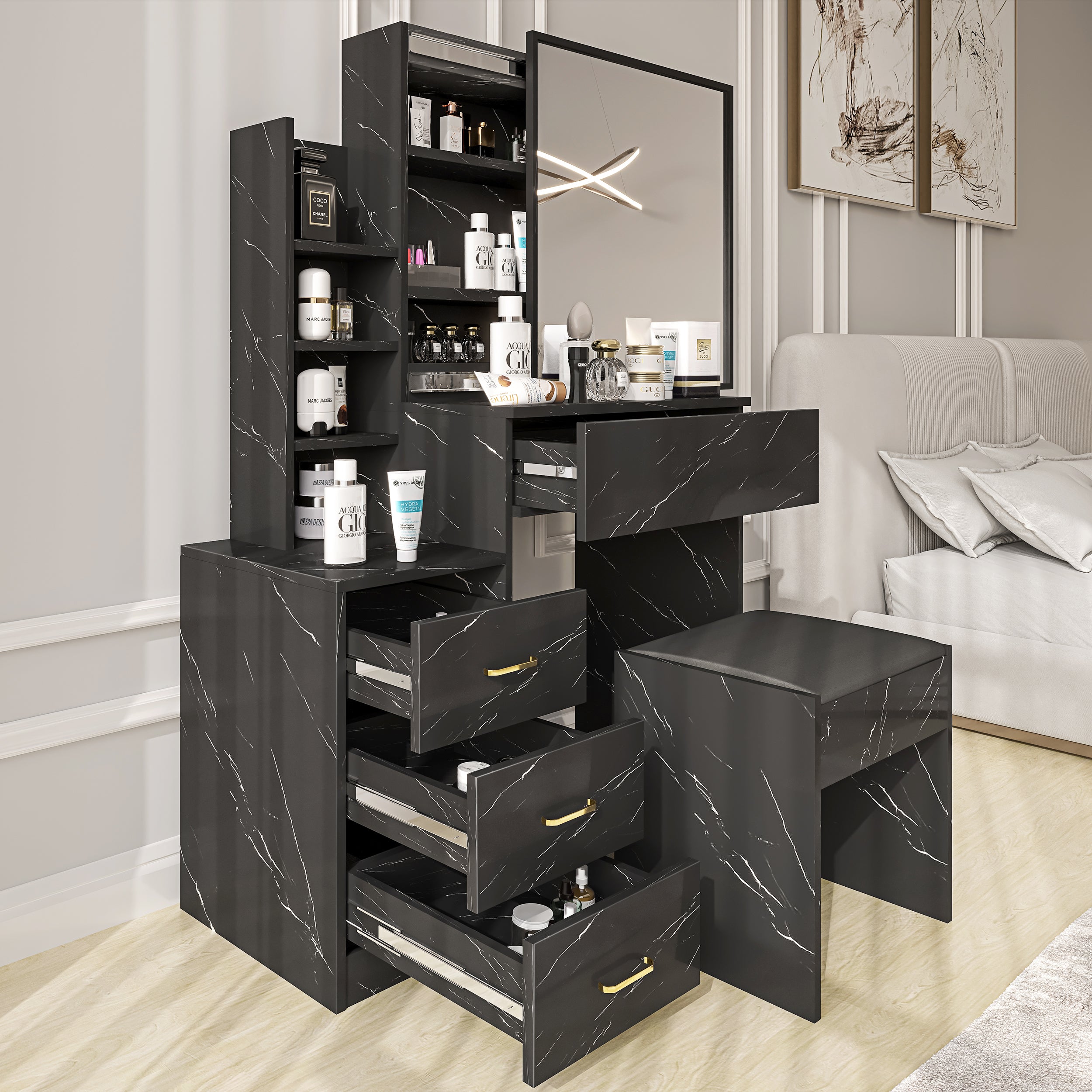 Black dressing tables with marble finish and storage drawers for modern bedroom decor.