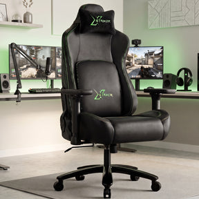 [Black] Ergonomic Gaming Chair with Headrest and Lumbar Support shown at an angle within a green-lit stream setup.