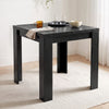 [Black] Close-up wood-grain closed tabletop, steel hinges, wide legs, mug, two glasses, white bowl, napkin and spoon
