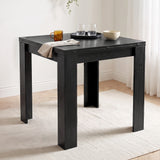 [Black] Close-up wood-grain closed tabletop, steel hinges, wide legs, mug, two glasses, white bowl, napkin and spoon