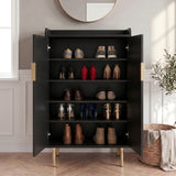 [Black] Fluted Shoe Storage Cabinet with both doors open displaying five shelves of trainers, heels, loafers, and boots in a panelled hallway