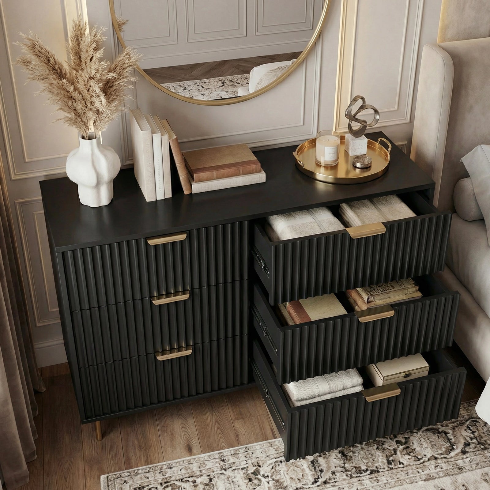 [Black] Black flutrina 6 drawer chest with right column drawers open showing folded linens, gold bar handles