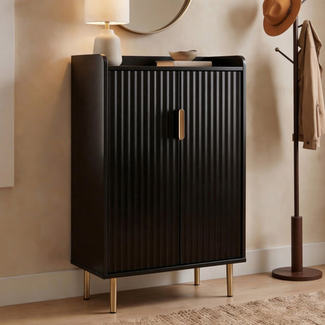 [Black | 60cm] Flutrina shoe cabinet from a side angle in a hallway with fluted doors closed and gold handle visible