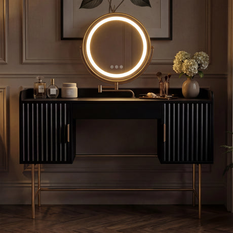 Black flutrina vanity table with LED lighting and gold legs, offering a sleek and modern look with a round mirror