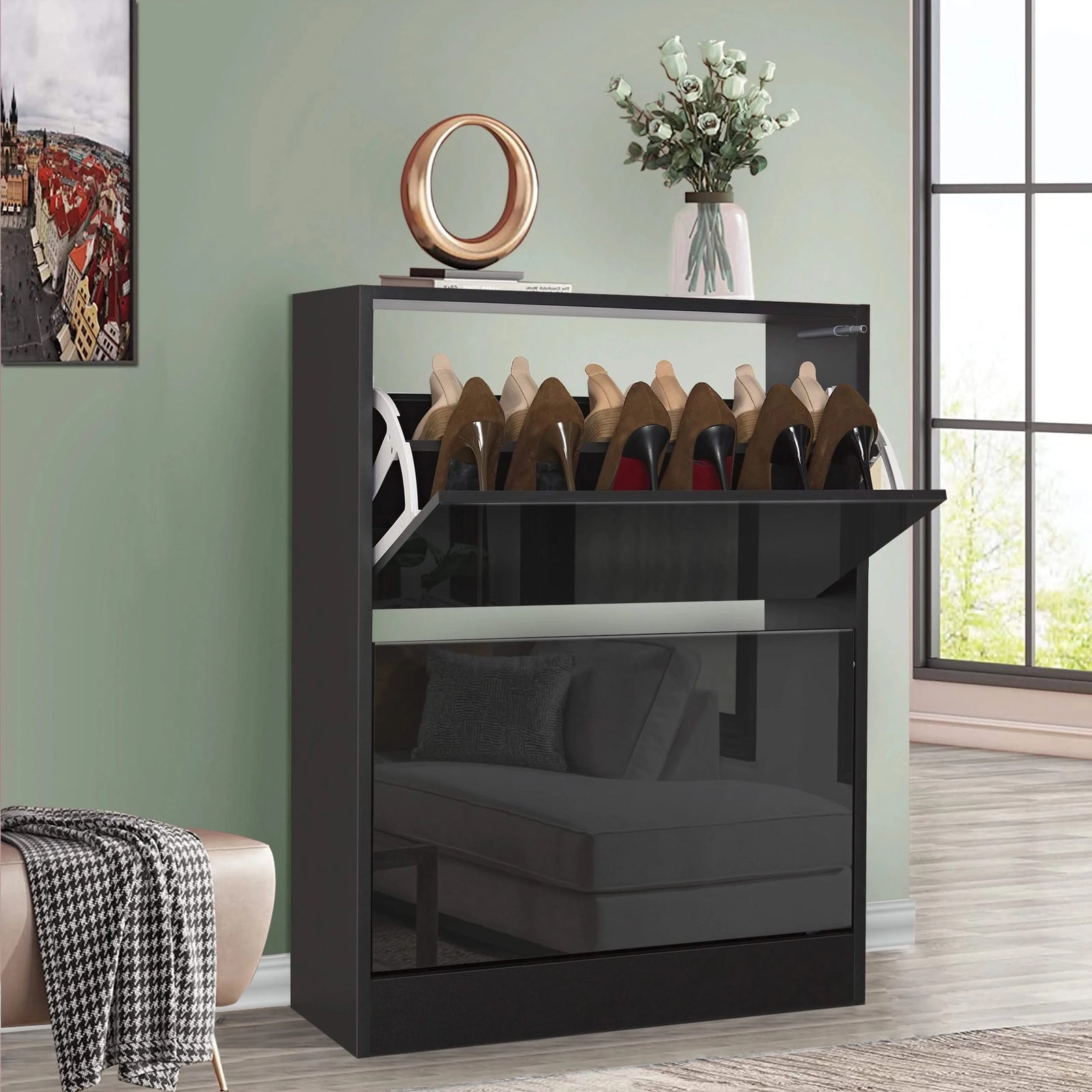 [Black] A 2 tier black gloss shoe cabinet with top drawer pulled down to display assorted shoes in use