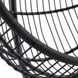 [Black] Close-up of a black woven chair with a rope seat on a white background