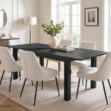 [160cm | Black] Hartley extended 200cm dining table with six cream chairs, leafy vase and books in a bright dining room.