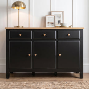[Black] Haven Large Black Sideboard with Drawers & Oak Top, Painted Finish straight-on look against a white panel wall.