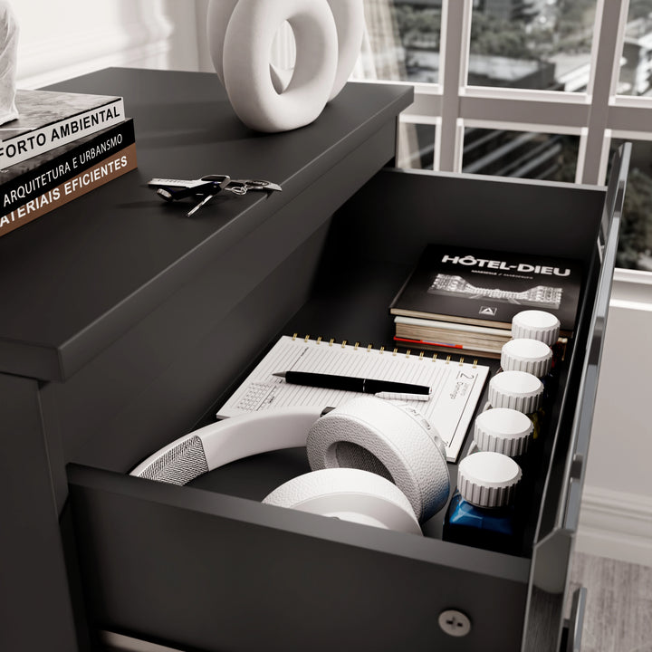 [Black] Close-up of drawer in black high gloss chest, showing storage for headphones, notebooks, and daily essentials.