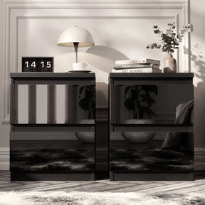 [Black] Two matching glossy black nightstands in a modern room setting, styled with a lamp, books, a digital clock, and a vase of flowers.