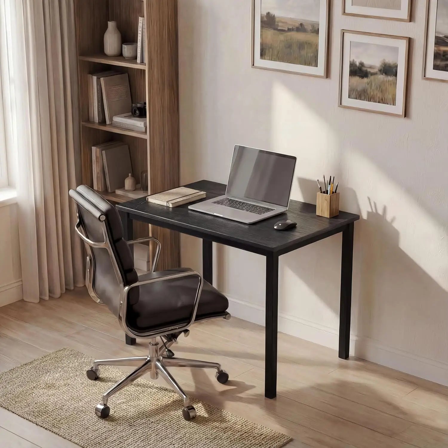 [80 X 50 cm] Home Office Desk arranged in a sunlit study corner with leather chair, laptop, notebook, pencil pot, and framed landscape art