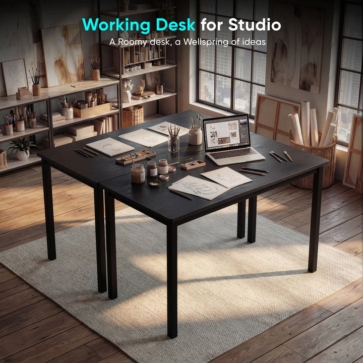 [120 X 50 cm] Black computer table 120x50cm in workroom scene with rolled paper and books
