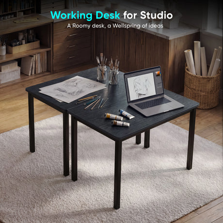[80 X 50 cm] Black home office desk 80cm as art studio with sketchbook, paint tubes and laptop on top