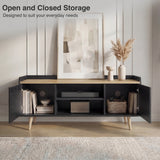 [Black | 112 cm] Larvik front view with both cabinet doors open revealing books, speaker, woven basket, and cable management holes in panelled room