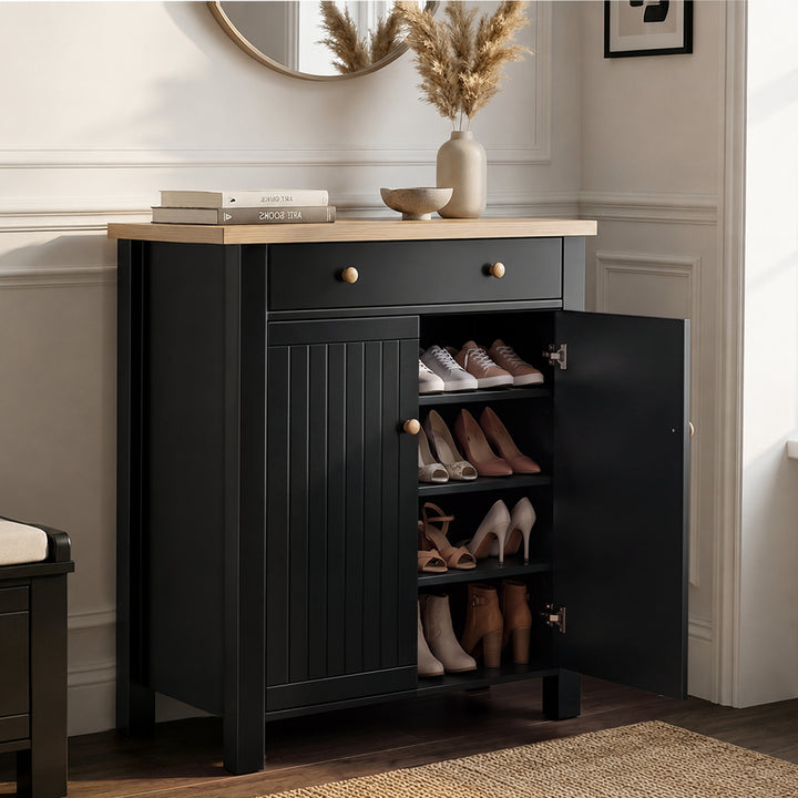 [Black] Linra shoe storage cabinet with right door open revealing four shelves storing trainers, heels, sandals, and ankle boots