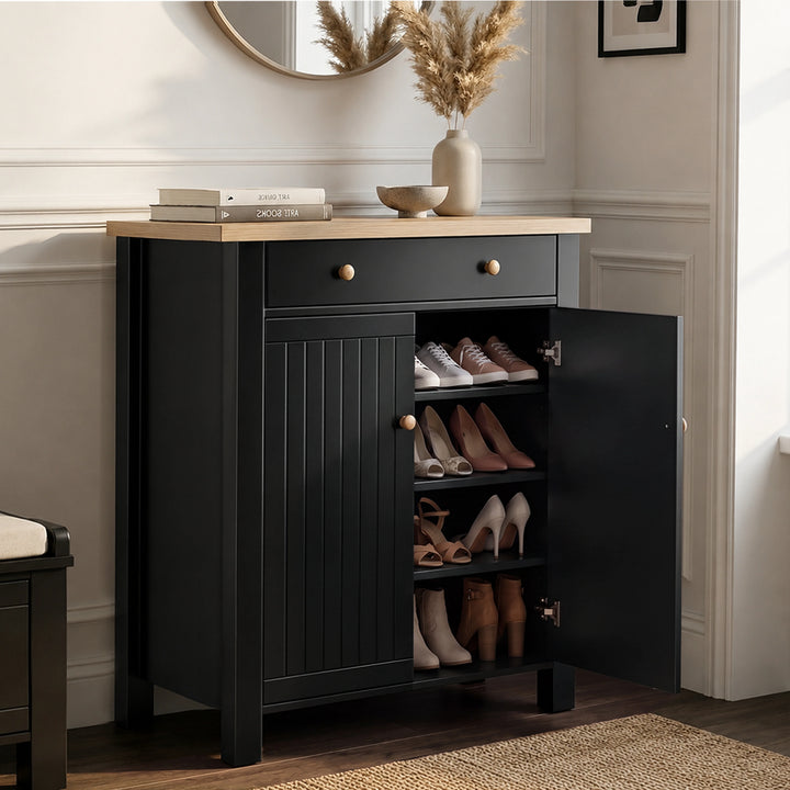 [Black] Linra shoe storage cabinet with right door open revealing four shelves storing trainers, heels, sandals, and ankle boots