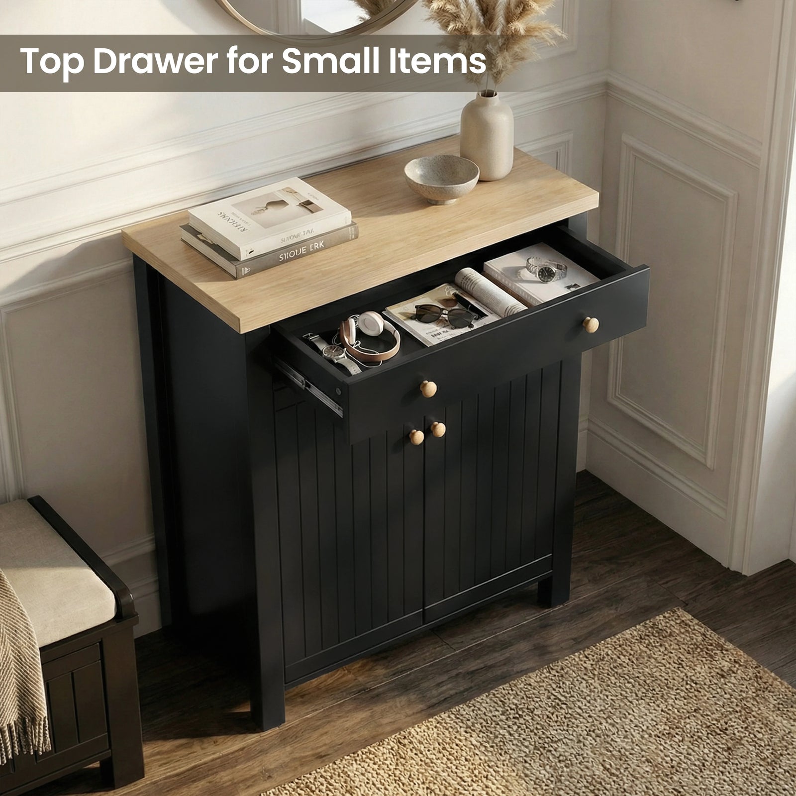 [Black] Linra shoe cabinet with top drawer pulled open holding headphones, sunglasses, and watch in a dark hallway setting