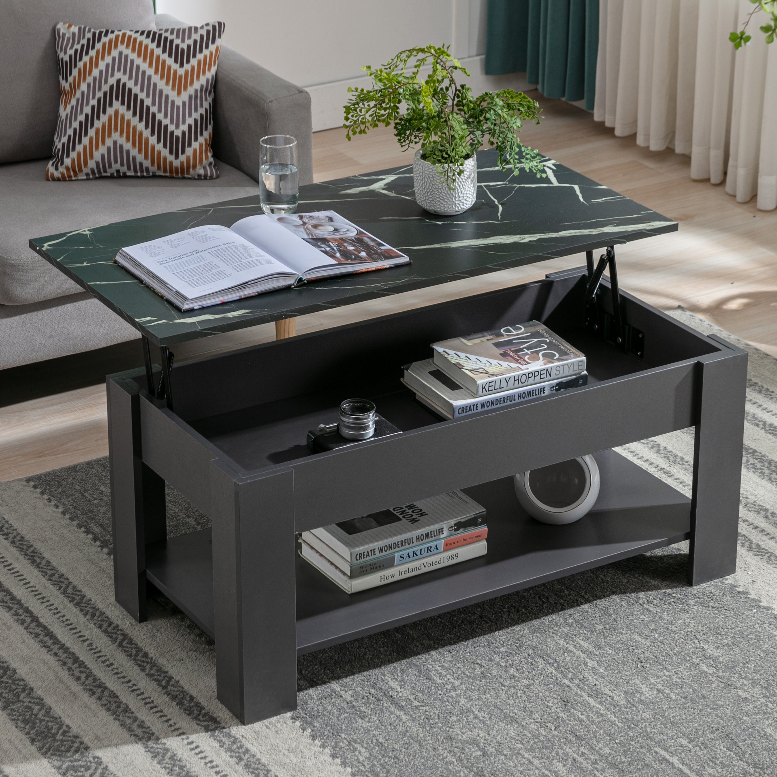 Black marble coffee table with modern design, featuring a lower shelf for storage.