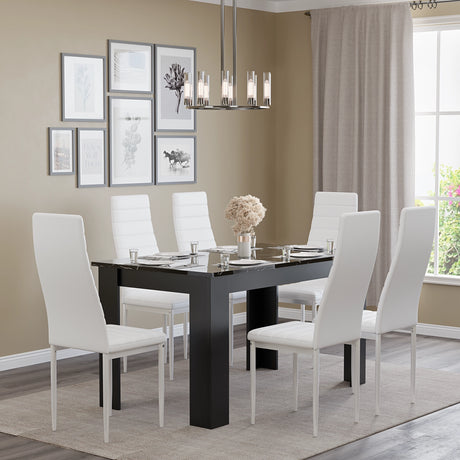 minimalist dining space with marble shade dining room table and chairs set in white leather