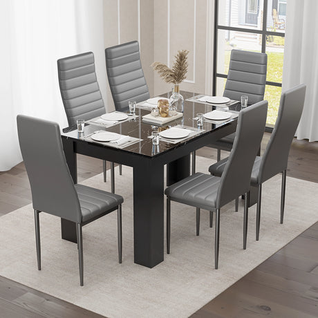 minimalist black dining table and 6 chairs set with grey leather upholstery and glossy marble top, perfect for social meals