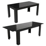 [Black Marble] Two studio views show the table closed and extended; the glossy veined top stands on thick black legs.
