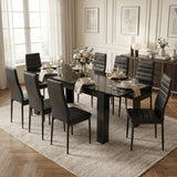 [Black Marble] Extended glossy marble-effect table for 6-8 for dinner; 8 black chairs surround its thick square legs.