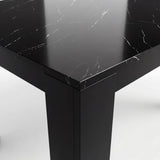 [Black Marble] Close-up of the glossy marble-effect tabletop corner; white veining runs above a thick black L-shaped leg.